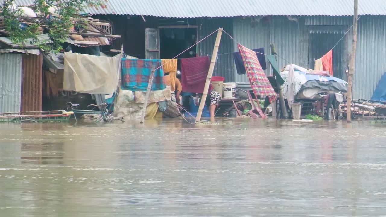 Flood in the Bangladesh slum, home underwater Monsoon season South Asia