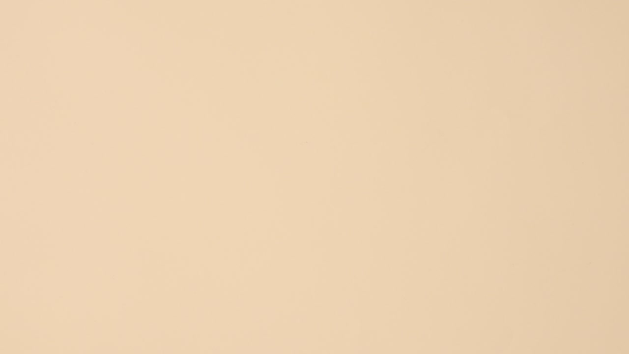 Wellness spa beauty products with towels appear on left and right side on beige background with copy space. Stop motion flat lay