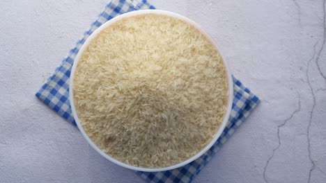 close-up view of a bowl of uncooked white rice