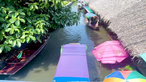 vibrant boats navigate a bustling canal market