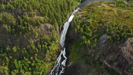 latefossen is one of the most visited waterfalls in norway and is located near skare and odda in the region hordaland, norway. consists of two separate streams flowing down from the lake lotevatnet.