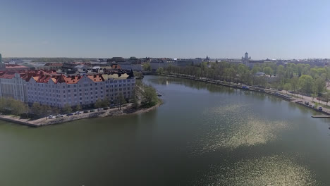 A-slow-moving-drone-shot-overlooking-Helsinki,-Finland-during-a-bright-clear-day