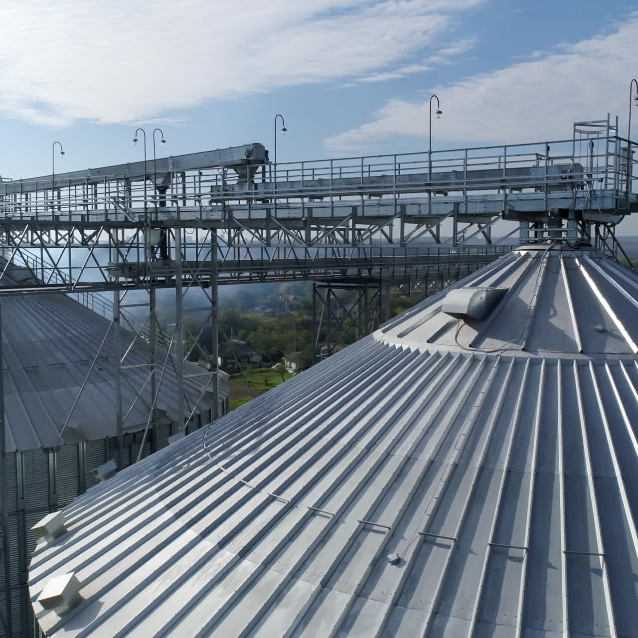 Huge industrial metal containers. Big factory metal constructions. Aerial view