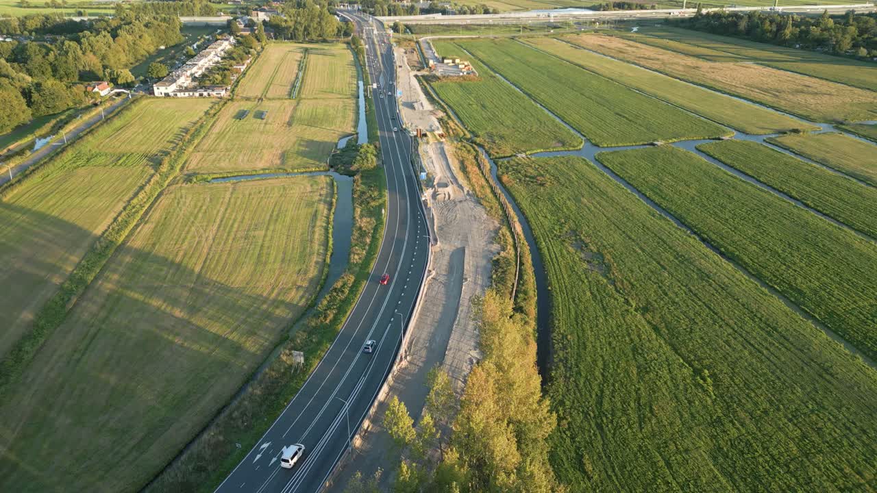 High drone shot showing new highway development in Leiden, Netherlands, connecting the city to the main road network