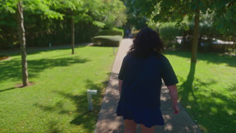 woman walking in a park