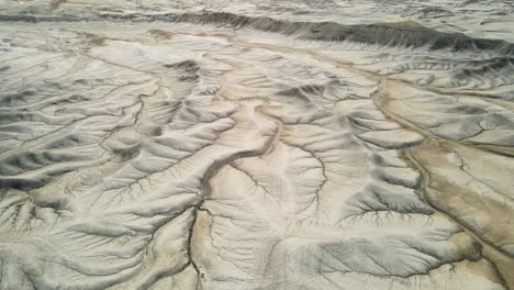 Aerial-focus-shot-of-stunning-rugged-geological-landscape-near-Utah