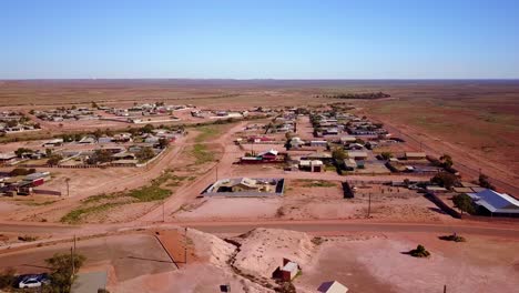 aerial drone shot reveals the outback bush opal mining town of coober pedy australia 4