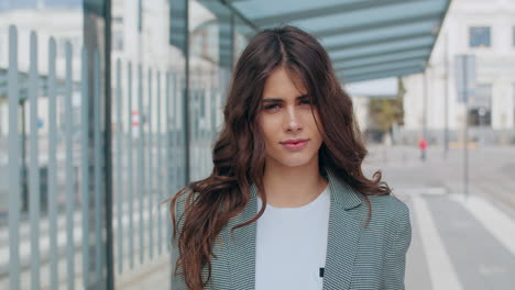 portrait of a young woman in an urban setting