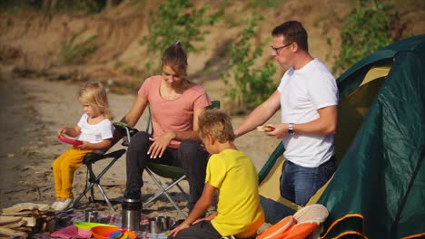 family camping trip on the beach