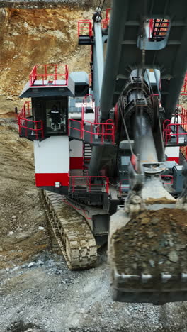 giant mining excavator in an open-pit quarry