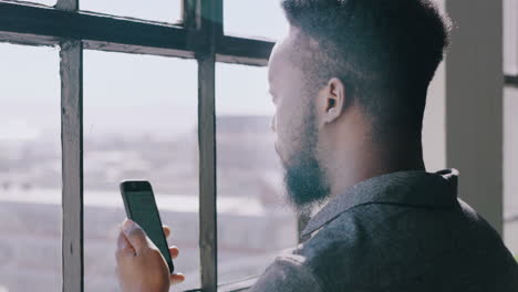 relax, coffee and phone with businessman by window
