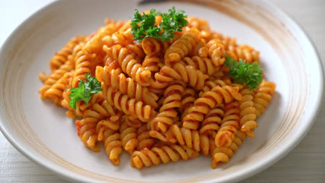 spiral-or-spirali-pasta-with-tomato-sauce-and-parsley---Italian-food-style