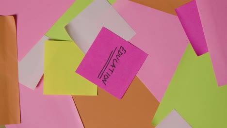 Education-Concept-Of-Revolving-Sticky-Notes-With-Education-Written-On-Top-Note