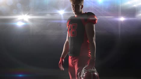 animation of male american football player holding helmet, over lights at floodlit stadium