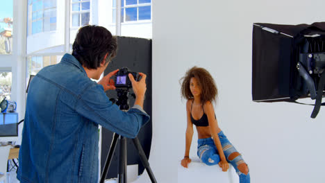 female model posing for a photoshoot in the studio 4k