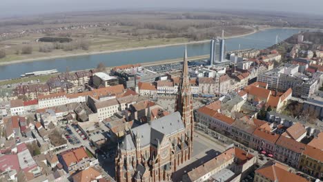 the city of osijek croatia with cathedral of st peter and paul at daytime - aerial drone shot