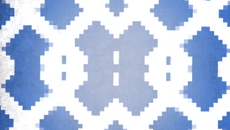 blue and white geometric pattern with diamond center