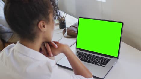 African-american-businesswoman-using-laptop-for-video-call-with-copy-space