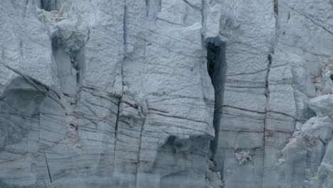 extreme close-up of the ice wall of margerie glacier in alaska