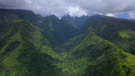 aerial view of lush green mountains and valley