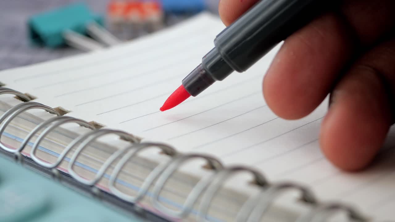 Writing numbers in a notebook