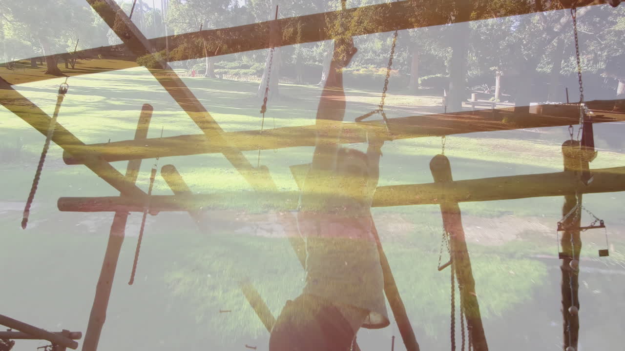 Child climbing jungle gym in park with animation of sunny background