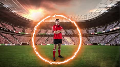 professional rugby player standing in front of a stadium