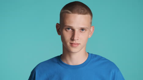 young guy with blue eyes smiling