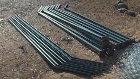 stack of angle iron posts welded and incomplete