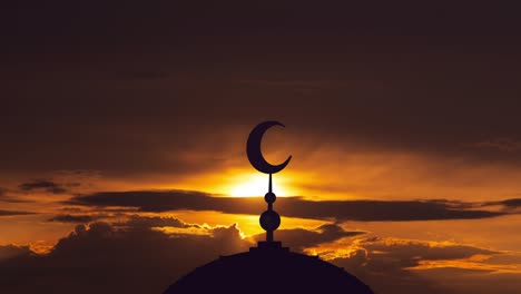 the islam symbol on a sunset background. time lapse