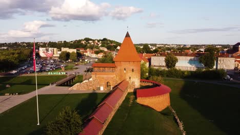 aerial footage of kaunas castle, situated in kaunas old town, lithuania in beautiful sunny evening