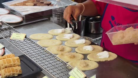 street food vendor preparing thai dessert