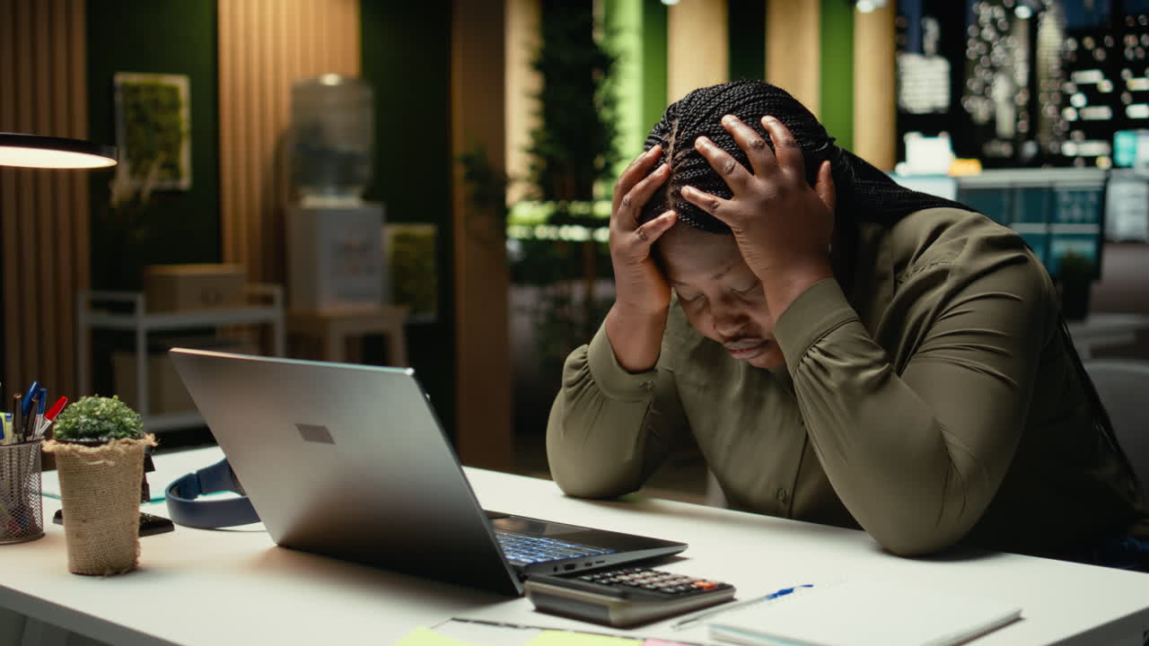 Black restless weary woman experiencing burnout and fatigue late at night