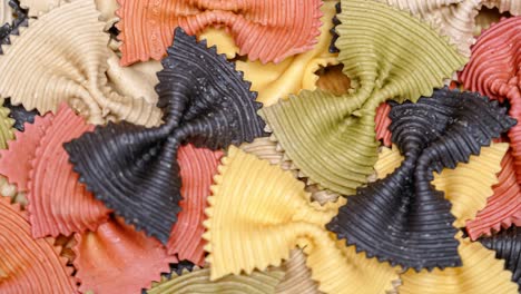 colored farfalle pasta bow tie pasta background.