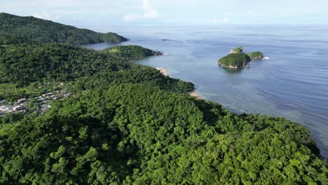 Aerial-Pan-of-hilly-tropical-coastline-and-islands,-Catanduanes,-Philippines