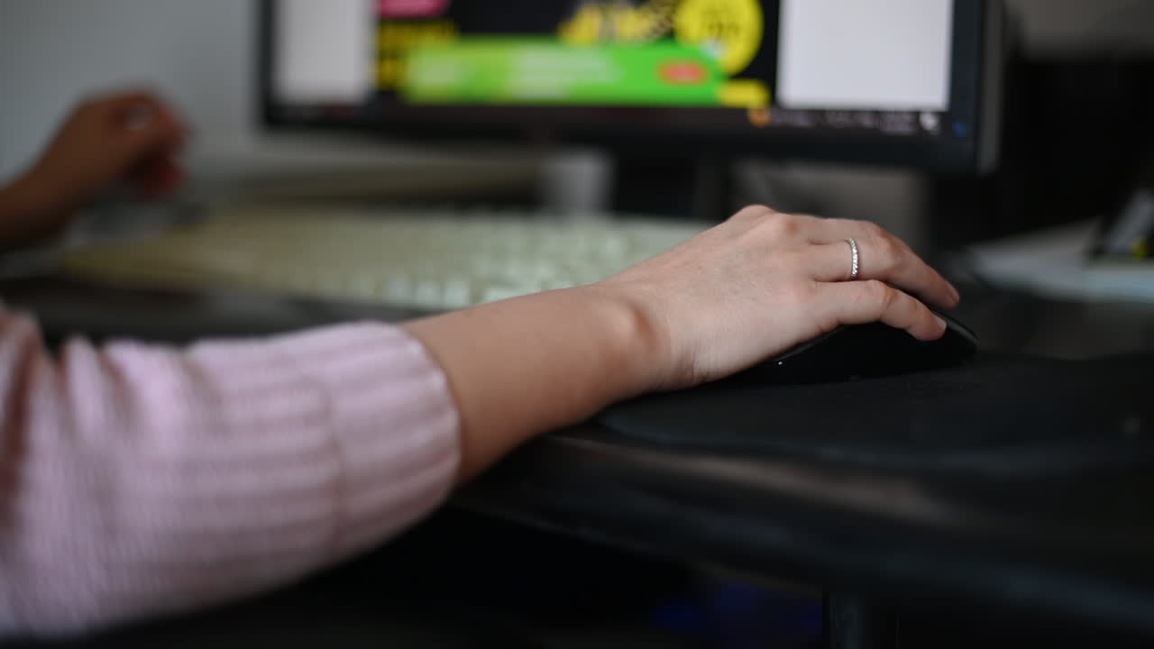 Woman working on the computer at the office