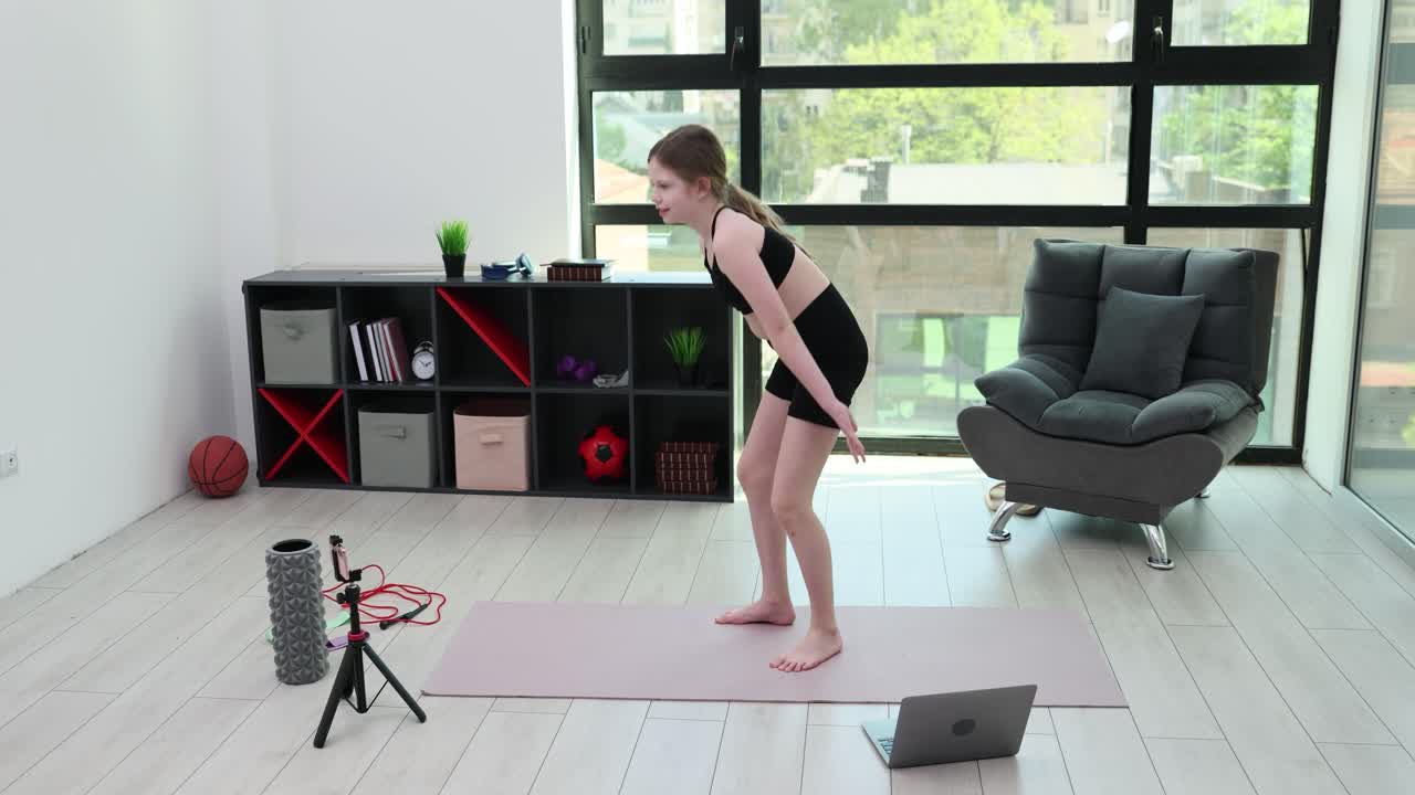 Woman doing squats at home workout