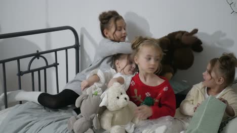 Adorable Little Children Rejoice in the Holy Christmas Merry Christmas and Happy Holidays Merry Christmas and Happy Holidays Adorable Little Children Make Cards Gifts and Decorations for the Holiday Cute Kids are Engaged in Creativity Sisters with New Year Gifts