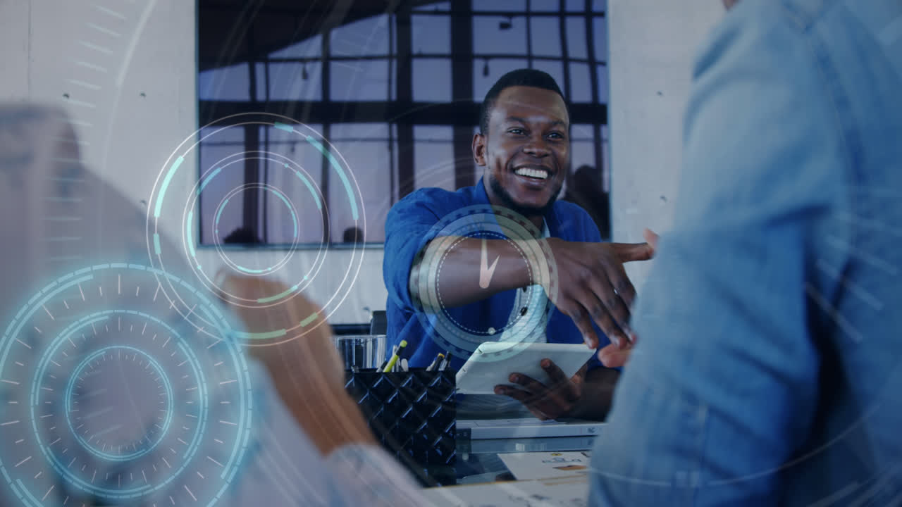 Animation of clock over diverse business people shaking hands