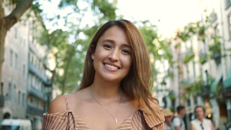 close-up view of happy woman posing at camera