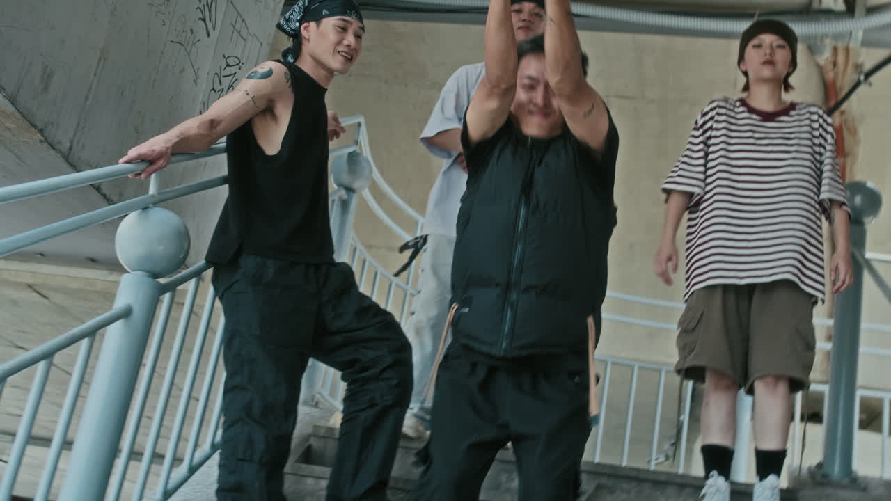 Guy Showing Freestyle Dynamic Choreography Outdoors