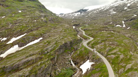 aerial view of the mountain pass at geiranger with sharp turns and steep mountainside