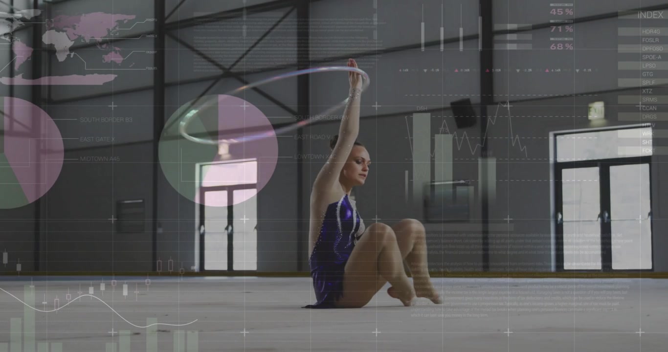 Stepping on mat gymnast balancing spinning hoop while kneeling showing skill charts overlaying hall