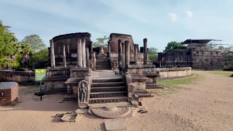 the entrance to the ancient polonnaruwa vatadage in sri lanka, showing the intricate carvings and impressive scale of this historic site