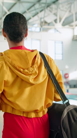 woman walking with bag