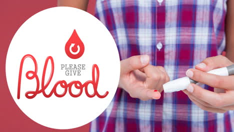 animation of give blood text with arrow in droplet logo over man taking pinprick blood test