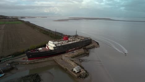 Abandoned-vessel-of-TSS-Duke-of-Lancaster,-aerial-ascend-view