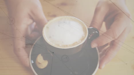latte foam cup being animated in 3d render, showing hands holding it beside broken biscuit