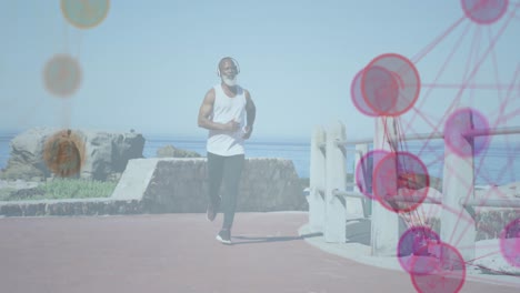 animation of network of connections over senior african american man running at beach