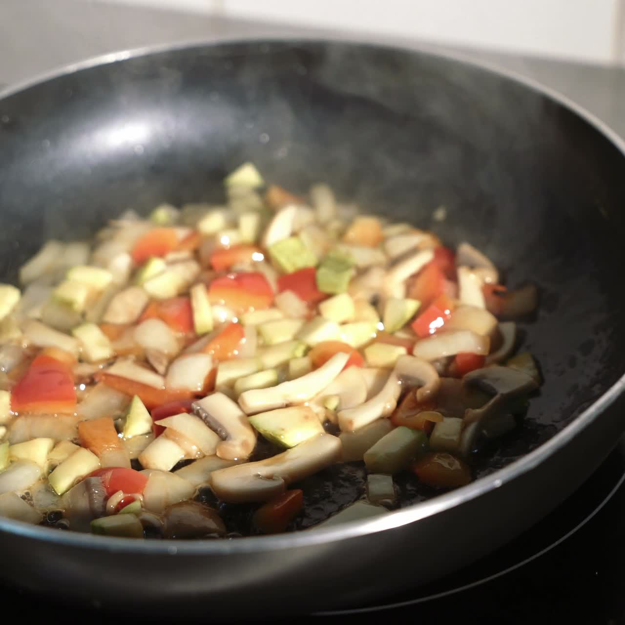 Vegetables fried in pan